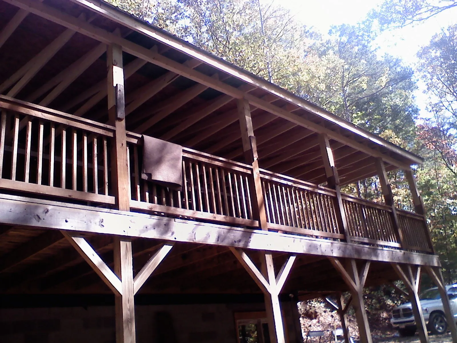 Timber framing under a new elevated porch and deck — Roof Leak Repair in Clearbrook by Roofing Brothers